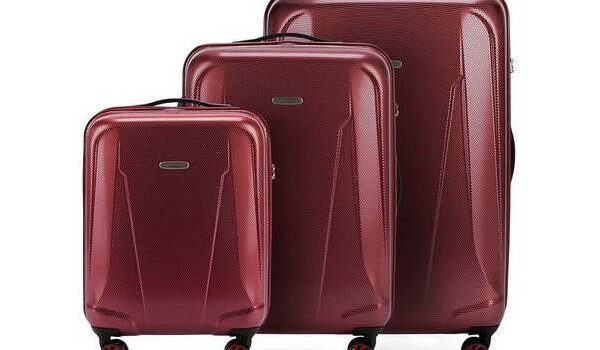 Twarda walizka z tworzywa sztucznego czy miękka z materiału? Którą lepiej wybrać?