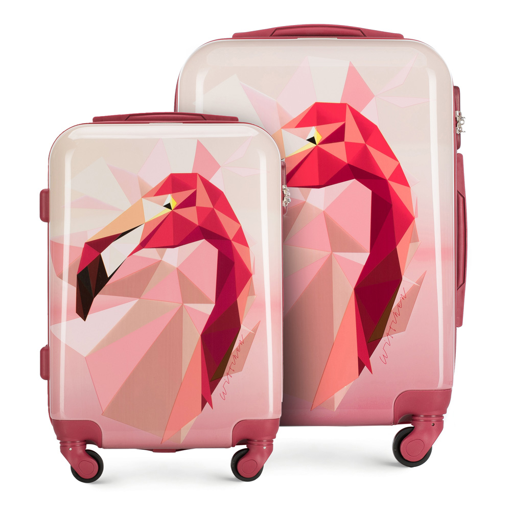 Różowe walizki we wzór flamingów