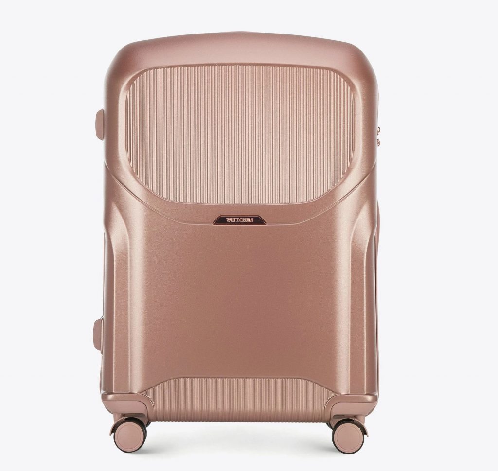 duża walizka z suwakiem w kolorze różowego złota